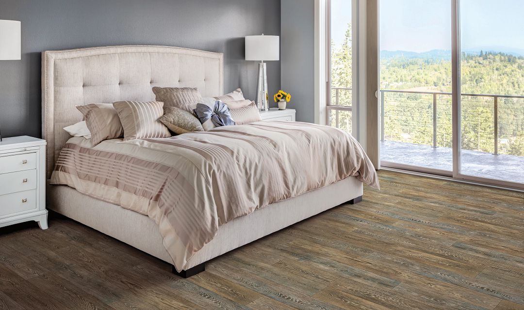 bedroom coastal bedroom pink comforter brown vinyl floor